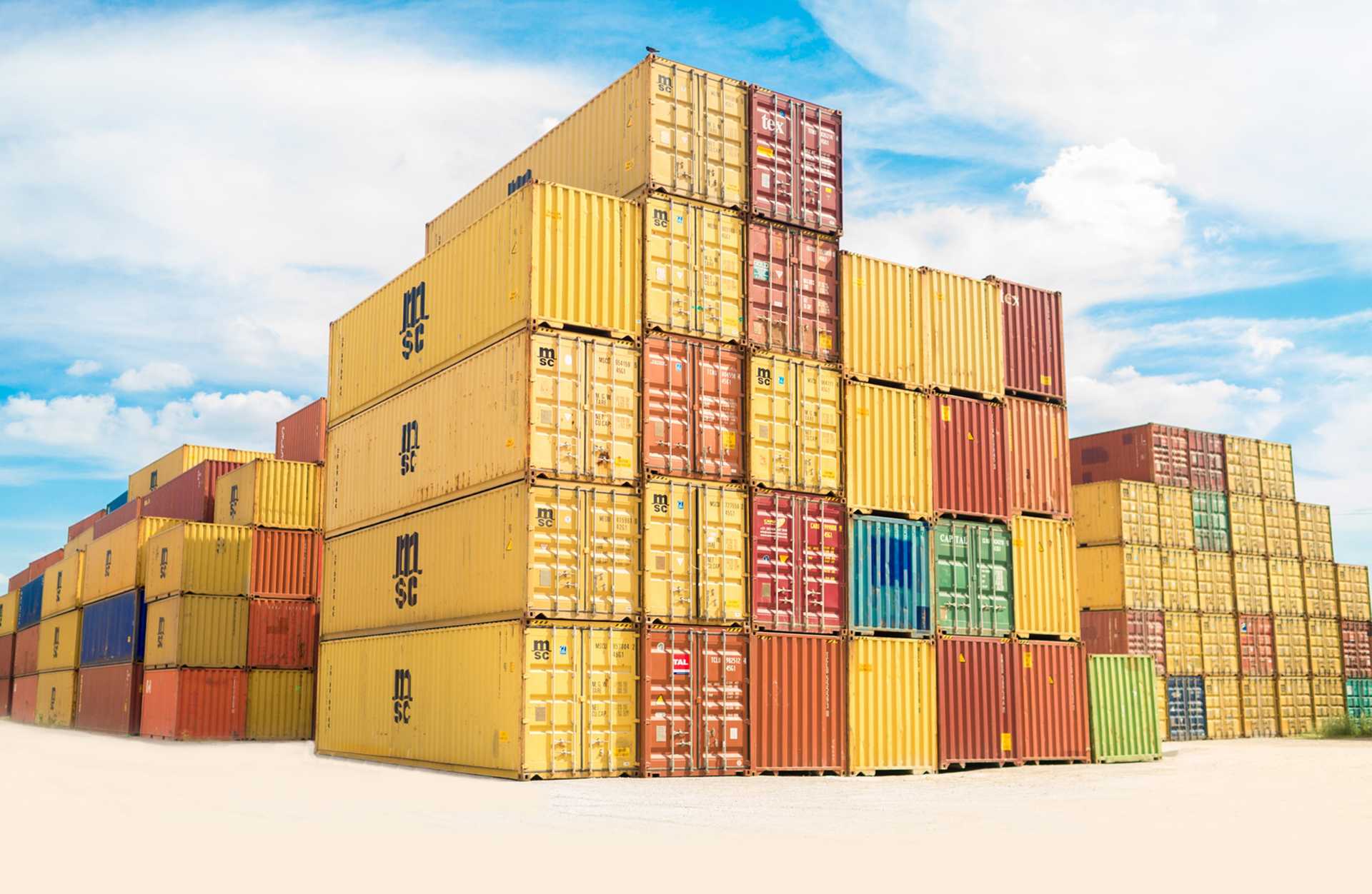 Shipping containers stacked in a lot